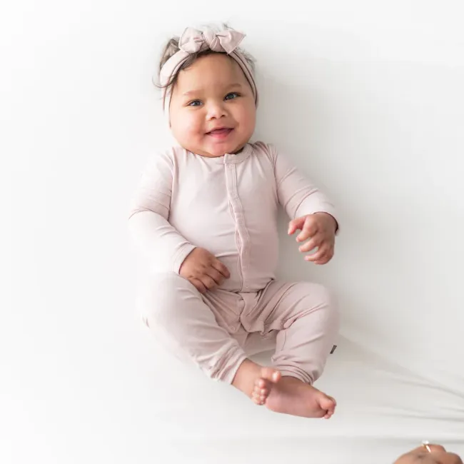 Kyte Baby Snap Romper in Blush