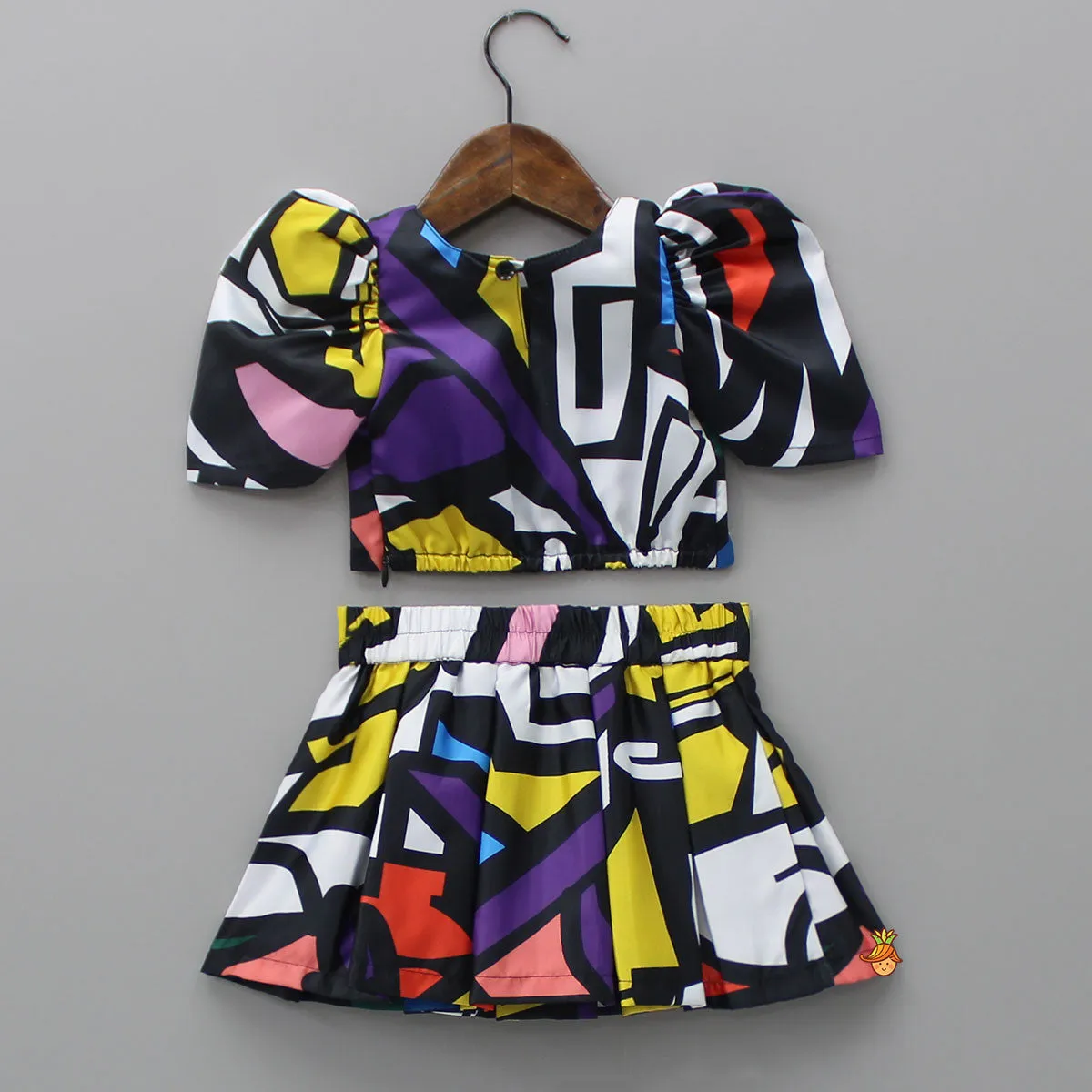 Pre Order: Geometric Printed Asymmetric Black Top And Skirt With Matching Hair Clip